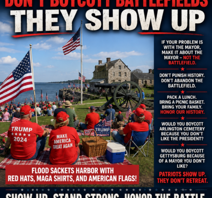 Patriotic poster showing people in red hats and MAGA shirts gathered with American flags near a historic waterfront battlefield and cannon at Sackets Harbor, with bold text encouraging patriots to show up and honor the battle.